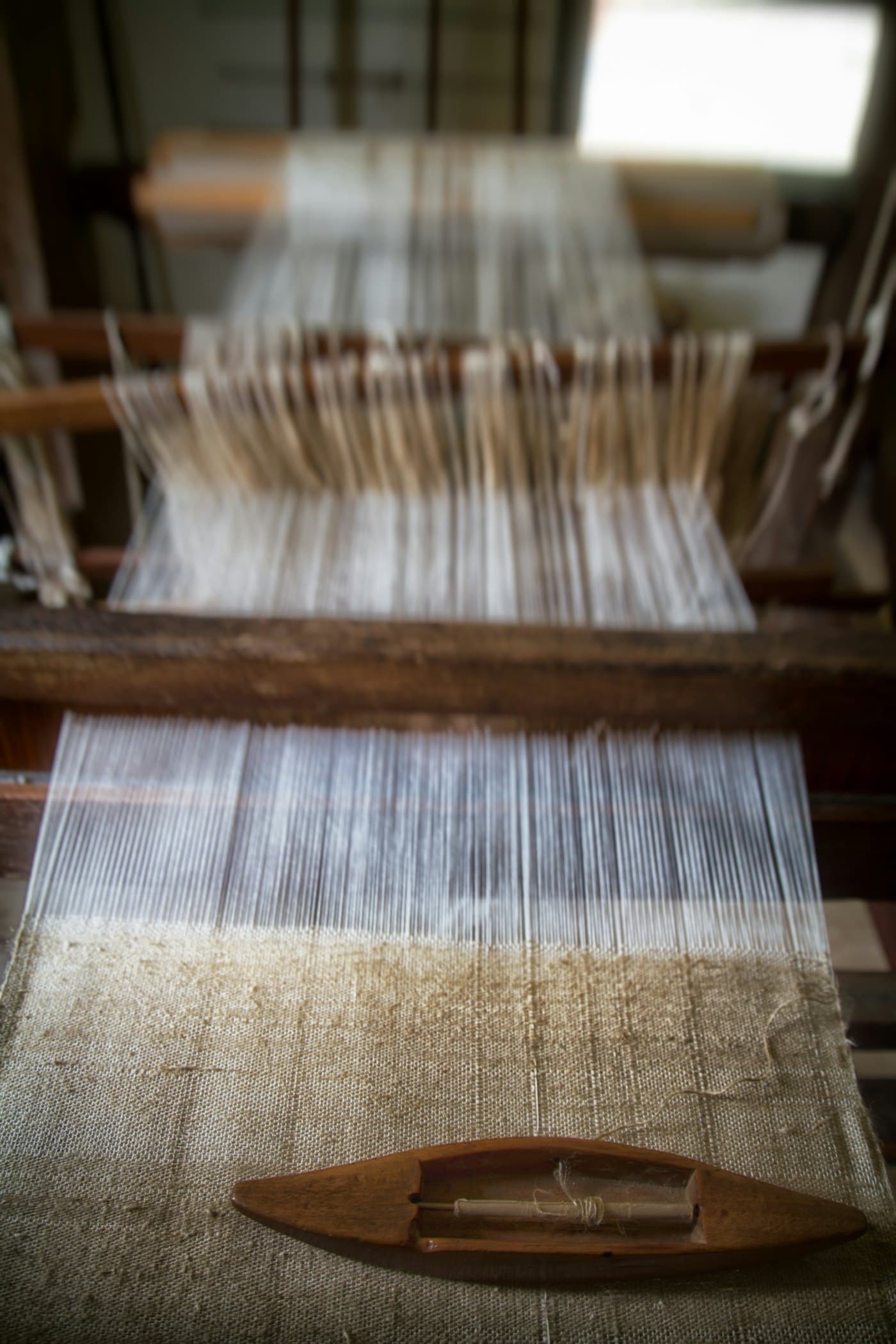 Threads on a traditional weaving loom